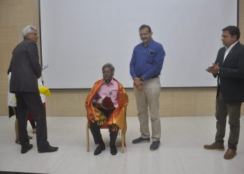 18.Shri.A.Rajarajan being felicitated by Dr.S.P.Rao and Dr.B.Hariprasad Reddy